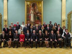 The new Liberal cabinet. Prime Minister Justin Trudeau, fifth from left, and Governor General David Johnston, centre, pose for a group photo with the new Liberal cabinet at Rideau Hall in Ottawa.