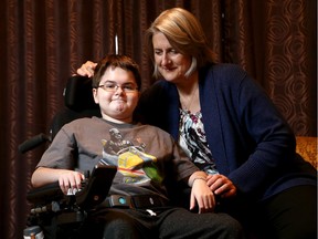 Debra Chiabai with her 15-year-old son, Alex , who has muscular dystrophy.