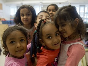 File photo of kids in kindergarten: Ottawa parents support the idea of having kindergarten children study half the day in English and half the day in French, according to a survey by the Ottawa public school board.