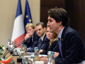 Prime Minister Justin Trudeau talks during a meeting at the G20 Summit in Ankara on November 16, 2015.