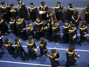 Graduates of the University of Calgary await their convocation in Calgary on june 8, 2015.
