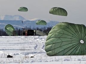 JOINT BASE ELMENDORF-RICHARDSON, Alaska -- Soldiers assigned to U.S. Army Alaska's 425th Brigade Special Troops Battalion airdropped a Humvee on JBER's Malemute Drop Zone, followed by approximately 60 Paratroopers from a C-17 aircraft, Wed. April 17, 2013.  The paratroopers of the 4th Brigade Combat Team (Airborne) 25th Infantry Division recently completed post-deployment RESET, and are transitioning the brigade to assuming part of the quick reaction force mission for the Pacific Theater. (U.S. Air Force photo/Justin Connaher)