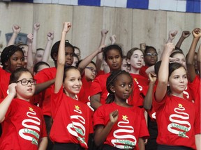 150 singers from La Chorale De La Salle from Ottawa's De La Salle High School and Le Groupe Allegro from École élémentaire public Séraphin-Marionat sing at the Museum of History in Gatineau on Friday, December 18, 2015 after the overwhelming response to their YouTube video of a choral piece by Ottawa-based composer Laura Hawley of the traditional song Tala' al-Badru 'Alalyna.