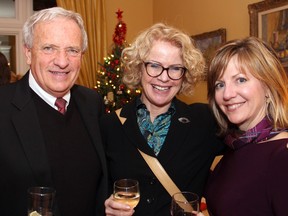 Aldo Chiappa from the City of Ottawa with Ann Meelker, director of sales and marketing at the Lord Elgin Hotel, and Scottish Society of Ottawa board secretary Heather Theoret, protocol advisor with the City of Ottawa, at a reception held at Earnscliffe, the official residence of the British high commissioner, on Thursday, December 3, 2015 to promote the upcoming Hogmanay New Year's Eve party. (Caroline Phillips / Ottawa Citizen)