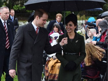 Britain's Prince William (L), Duke of Cambridge and his wife Catherine, Duchess of Cambridge attend a traditional Christmas Day Church Service at Sandringham in eastern England, on December 25, 2015.