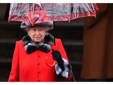 Britain's Queen Elizabeth II attends a traditional Christmas Day Church Service at Sandringham in eastern England, on December 25, 2015.