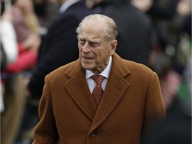 Britain's Prince Philip arrives with family members to attend the traditional Christmas Day church service, at St. Mary Magdalene Church in Sandringham, England,  Friday, Dec. 25, 2015.