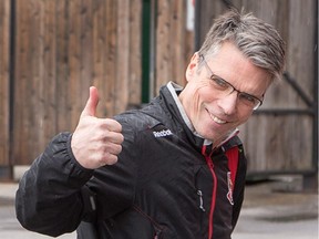 APRIL 21: Coach Dave Cameron gives a thumbs up as heads into the Bell Sensplex for an Ottawa Senators practice.