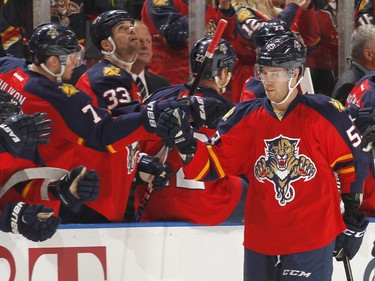 Florida Panthers forward Corban Knight (53) is congratulated by teammates after scoring a goal against the Ottawa Senators during the second period.