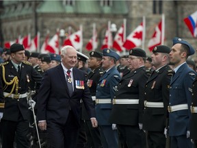 Governor General David Johnston inspects the honour guard before delivering the speech from the throne on Parliament Hill on Friday, Dec. 4, 2015 in Ottawa.