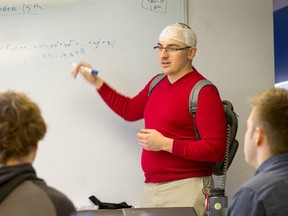 Denis Raymond is a teacher at Blythe Academy who has incurable brain cancer. His life has been prolonged by wearing an electronic device on his head that sends a mild electrical current through his brain. One student asked if he was a cyborg.