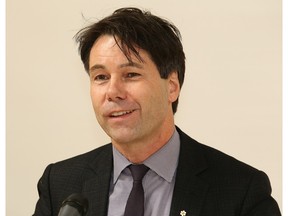 Eric Hoskins, Ontario Minister of Health and Long-Term Care makes a point during a funding announcement for a PET scanner at Health Sciences North in Sudbury, Ont. on Tuesday December 15, 2015. John Lappa/Sudbury Star/Postmedia Network