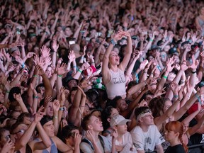 JULY 8, 2015: Fans enjoy the DJ ensemble Jack U, featuring Skrillex and Diplo, on the Bell Stage as the RBC Ottawa Bluesfest, the annual music festival, got underway at the Canadian War Museum.