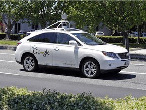 This May 13, 2014 file photo shows a Google self-driving Lexus at a Google event outside the Computer History Museum in Mountain View, Calif. Of the nearly 50 self-driving cars rolling around California roads and highways, four have gotten into accidents since September, 2014. That's when the state officially began permitting these cars of the future, which use sensors and computing power to maneuver around traffic. Three accidents involved souped-up Lexus SUVs run by Google Inc. The fourth was an Audi retrofitted by the parts supplier Delphi Automotive. Google and Delphi said the accidents were minor and their cars were not at fault.(AP Photo/Eric Risberg, File)