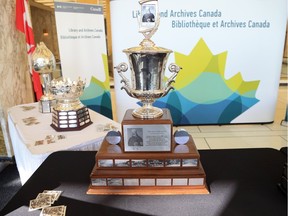 Five major NHL hockey trophies are on display at Library and Archives Canada Sunday as part of the Marching as to War exhibition. This is the Jack Adams Award for coach of the year.