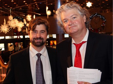 From left, Christmas FanFair Concert organizer David Thies-Thompson, a violist with the National Arts Centre Orchestra, and Matthew Larkin, choral director of the Christ Church Cathedral Choir of Men and Boys, at the NAC on Sunday, December 13, 2015, for the orchestra's annual free concert in aid of the Ottawa Food Bank and Snowsuit Fund.