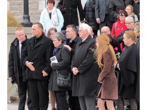 Family and friends outside the funeral for Grace Glofcheskie at St. John Chrysostom Catholic Church in Arnprior Saturday December 19, 2015.