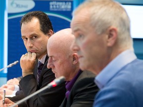 General Manager of Transit Services, John Manconi, (left), looks on as Bluesfest director Mark Monahan (right) speaks to the transit commission meeting on Thursday.