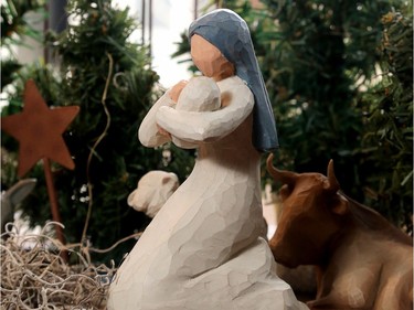 One of five crèches, or nativity scenes, this one in the family room window is from the Willow Tree collection of hand-carved sculptures by artist Susan Lordi.
