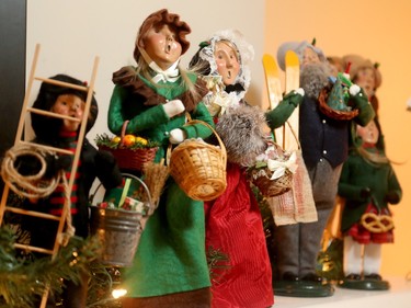 Victorian-styled Christmas carollers are lined up on the living room mantel. Found through Byer’s Choice in the United States, Nora’s parents started her on them. ‘I was buying them every year and now I figure I’ve got enough,’ she says.