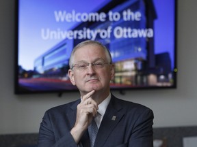 Jacques Frémont waits to speak at a press conference where he is to be announced as the president-designate of the University of Ottawa on Friday.