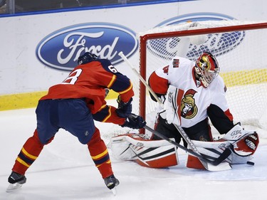 Florida Panthers right wing Jaromir Jagr (68) attempts a shot at Ottawa Senators goalie Craig Anderson during the first period.