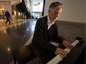 Retired piano teacher Brian King drives from his home in the Carlingwood area almost every day to play the baby grand at Ottawa City Hall.