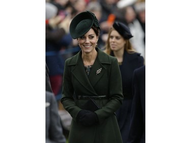 Kate the Duchess of Cambridge arrives with other members of the British royal family to attend their traditional Christmas Day church service, at St. Mary Magdalene Church in Sandringham, England,  Friday, Dec. 25, 2015.