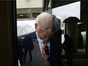 Sen. Mike Duffy, a former member of the Conservative caucus, arrives at the courthouse for his trial in Ottawa on Tuesday, Dec. 8, 2015.