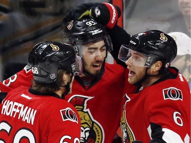 Ottawa Senators' Mika Zibanejad (93) celebrates his goal with teammates Bobby Ryan (6) and Mike Hoffman (68) during second period NHL hockey action against the Boston Bruins in Ottawa on Sunday, December 27, 2015.