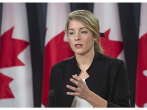 Minister of Canadian Heritage Melanie Joly announces the momument for the victims of communisim will start over with a new location and selection process Thursday, December 17, 2015 in Ottawa.