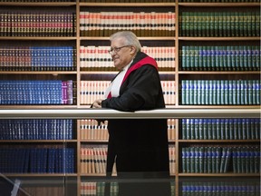 Ontario Court Justice Jack Nadelle pauses at the Ottawa Courthouse Dec. 16, 2015. Nadelle is retiring in January after 38 years as a judge in Ottawa.