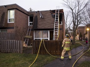 Emergency crews where called to 3555 Downpatrick Rd where a fire broke out on the second storey of a townhome, Dec. 6, 2015.