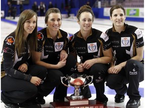 Rachel Homan, left, and teammates Emma Miskew (third), Joanne Courtney (second), and Lisa Weagle (lead).