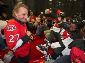 Ottawa Senators owner Eugene Melnyk hosts approximately 100 local school children at Canadian Tire Centre for his 12th annual "Eugene Melnyk Skate for Kids".