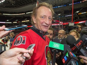Ottawa Senators owner Eugene Melnyk is scrummed by the media as he hosts approximately 100 local school children at Canadian Tire Centre for his 12th annual "Eugene Melnyk Skate for Kids". Assignment - 122448 (Wayne Cuddington/ Ottawa Citizen)