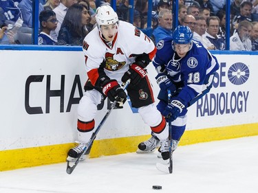 Ondrej Palat #18 of the Tampa Bay Lightning battles against Kyle Turris #7 of the Ottawa Senators during the second period.