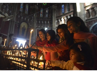 Pakistani Christians attend Christmas Day prayers at the Sacred Heart Cathedral Church in Lahore on December 25,  2015. Christians make up around 1.6 percent of Pakistan's overwhelmingly Muslim population, with large settlements across major cities and around 60,000 in Islamabad.