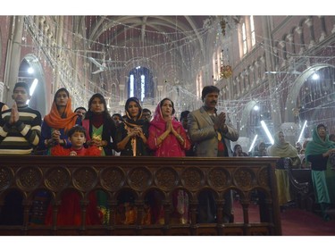 Pakistani Christians attend Christmas Day prayers at the Sacred Heart Cathedral Church in Lahore on December 25,  2015. Christians make up around 1.6 percent of Pakistan's overwhelmingly Muslim population, with large settlements across major cities and around 60,000 in Islamabad.