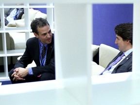 Roland Paris in a holding room at the COP21 conference in Paris with Prime Minister Justin Trudeau.
