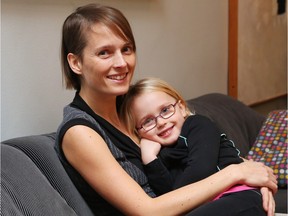 Samantha McGavin and her daughter, Astrid Reinecke-McGavin, who received a suspension notice effective Jan. 4 because she was missing a booster shot for tetanus-polio-diphtheria. McGavin scrambled to schedule Astrid's shot for Dec. 23 but is worried that the update info might not get to Ottawa Public Health in time.