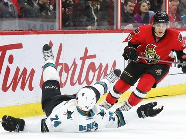 Shane Prince of the Ottawa Senators avoids Dylan DeMelo of the San Jose Sharks first period NHL action.