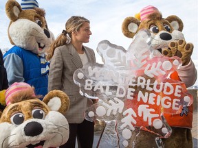 The Honourable Melanie Joly, Minister of Canadian Heritage, is joined by the Ice Hogs at the Fairmont Chateau Laurier Hotel for the official unveiling of activities taking place during the 38th Winterlude.