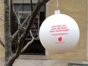 The Ottawa Food Bank has hung ornaments like these from approximately 1,000 trees as part of a contest to help raise awareness of the organization's need at this time of year.