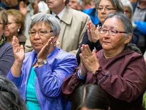 Women in the audience react to the call for an inquiry into missing aboriginal women and girls during the presentation of the report of the Truth and Reconciliation Commission at the Delta Hotel on June 2.  (Wayne Cuddington / Ottawa Citizen)