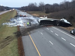 Mail is strewn along Highway 401 following a serious crash between two tractor trailers early Saturday.