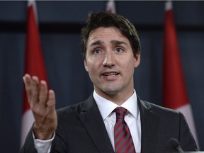 Prime Minister Justin Trudeau holds a media availability to discuss various government issues in Ottawa, on Wednesday, Dec. 9, 2015.