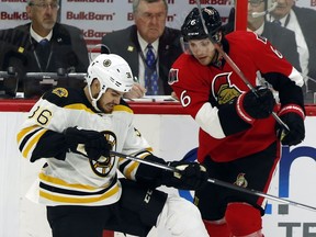 The Senators' Bobby Ryan, seen battling the Bruins' Zac Rinaldo along the boards on Sunday, Dec. 27, 2015