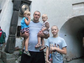 Serhii Vakurov with his children, from left, Vladimir, Kirill and Lev