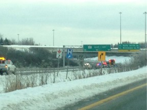 Paramedics said a man believed to be in his 40s was pronounced dead at the scene after his car landed on its roof on Highway 416.